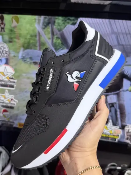 Le Coq Sportif Negro / Azul y rojo