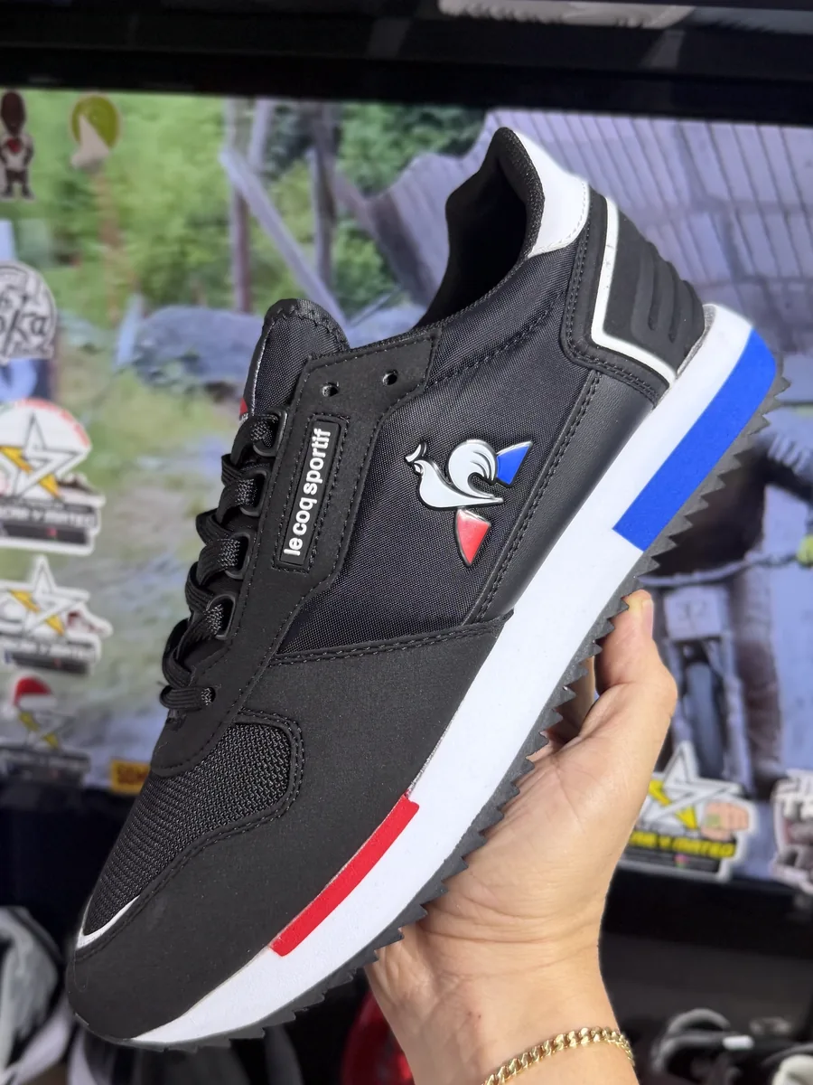 Le Coq Sportif Negro / Azul y rojo