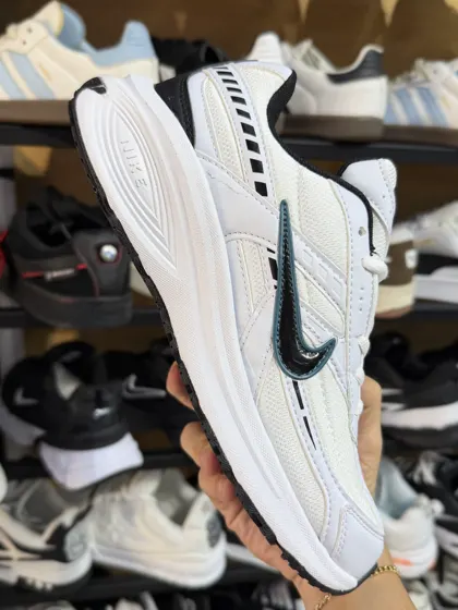 Nike Running Blanco / Negro con detalle azul