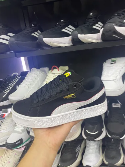 Puma Suede XL Negro con detalle rosa